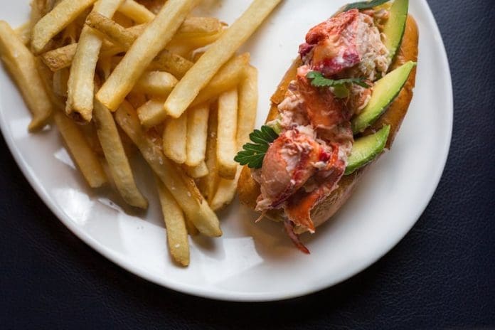 lobster roll with fries madison fender photography claudios greenport long island outdoor dining - East End Taste Magazine
