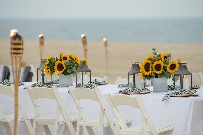 private beach dinner event sunflowers the hamptons