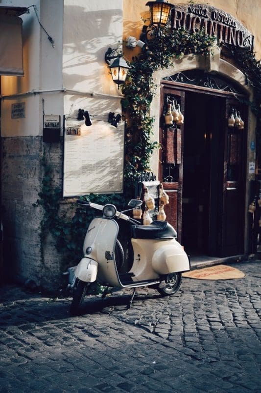 naples italy motor scooter cobble street