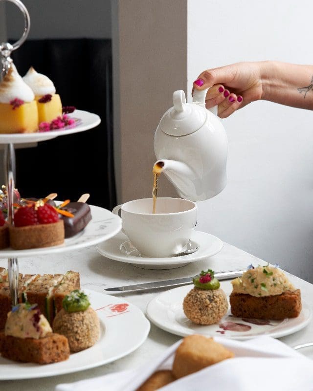 afternoon tea pour beautiful table setup tier tray
