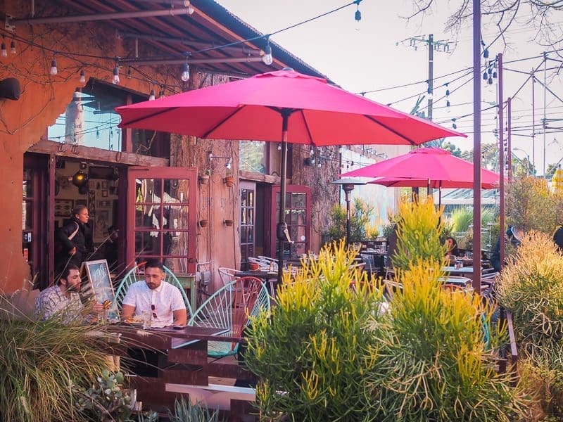 costa mesa outdoor restaurant red umbrellas