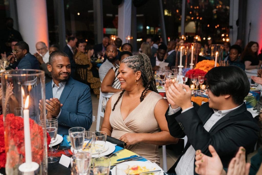 people sitting and enjoying fundraiser dinner in NYC