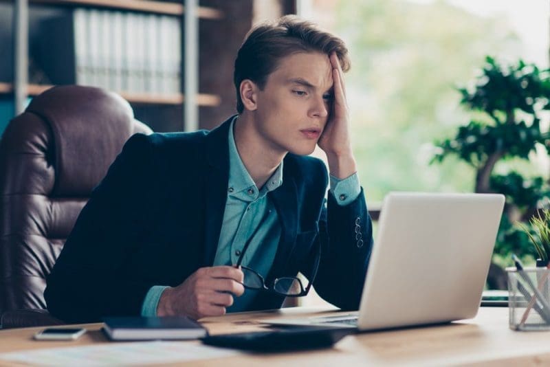 Portrait of negative guy feel ill sick have tension difficult decision