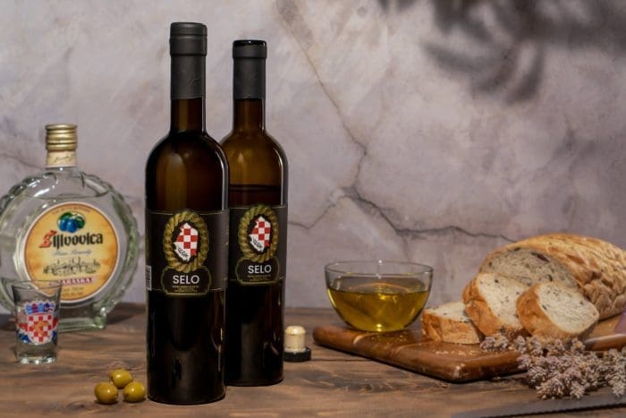 selo olive oil bottles on table