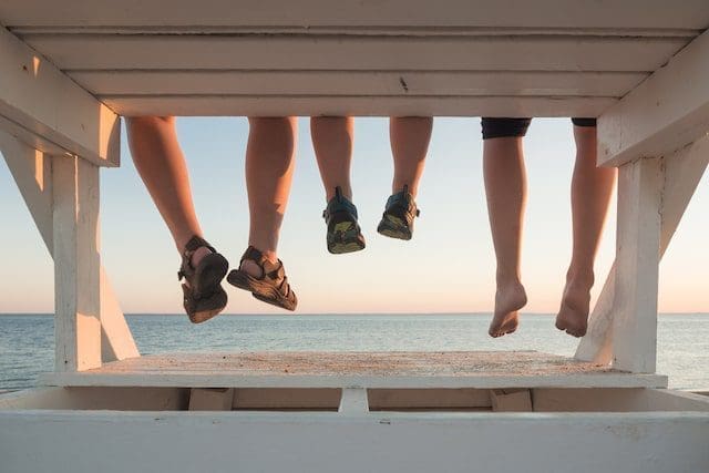 Family hanging together at sunset