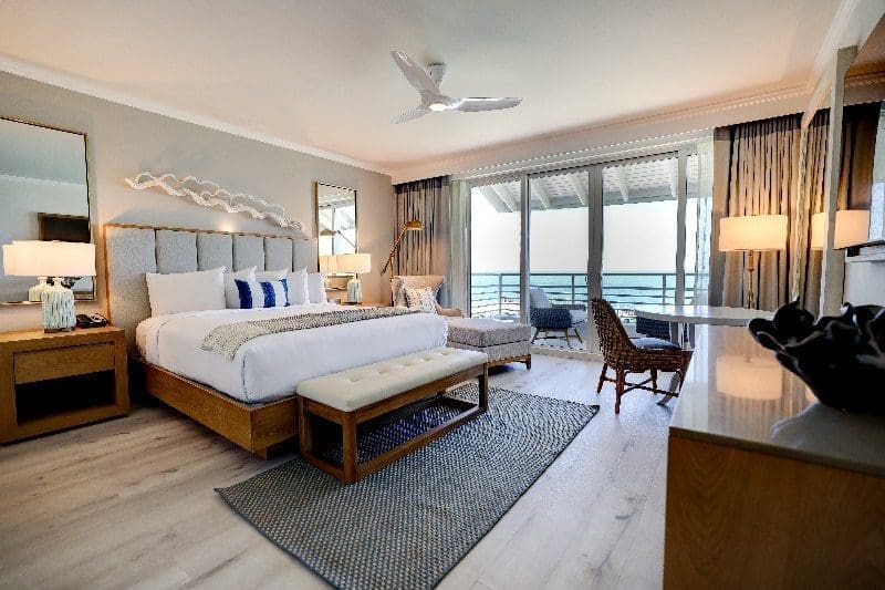 south seas island resort guestroom hotel white sheets gulf coast view