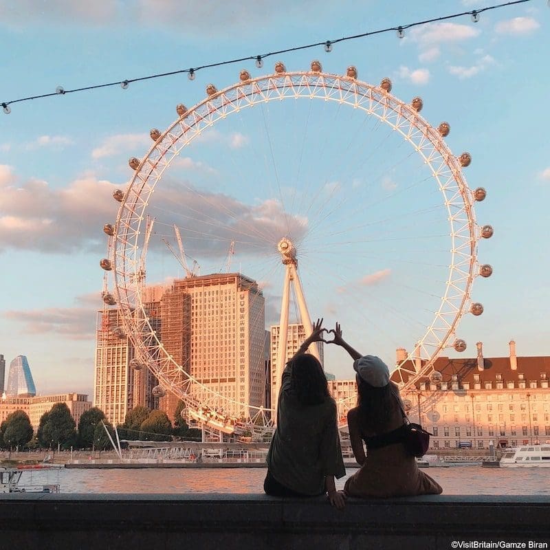 Girls in front of London Eye