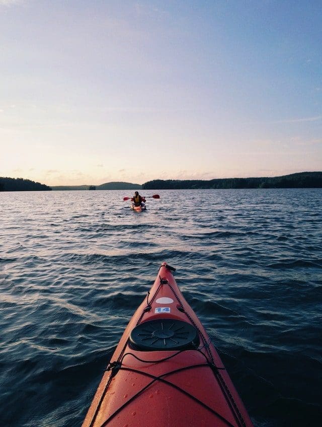 canoe on lake sunrise