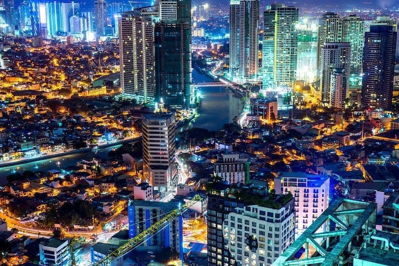 Skyline of Manila by the River Pasig