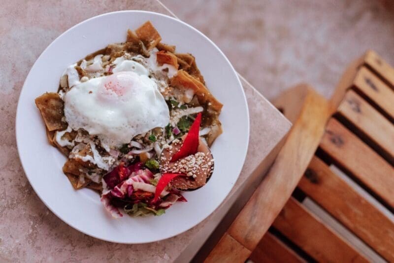 Huevos Rancheros breakfast on white plate