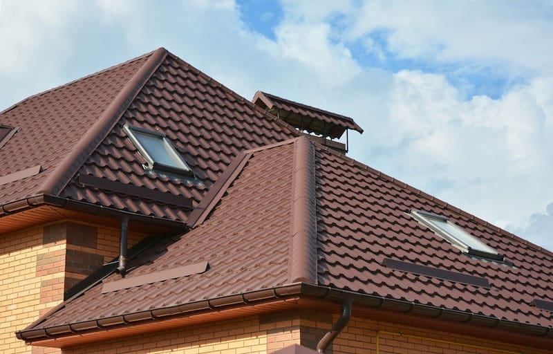 New roofing construction with attic skylights, rain gutter system