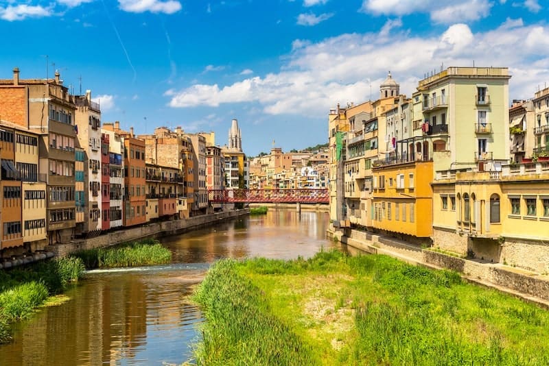 Colorful houses and Eiffel bridge in Girona Spain